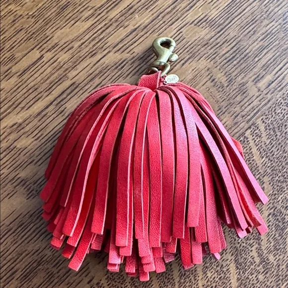 Clare V. Leather red poof tassel, no longer available. - Picture 1 of 3